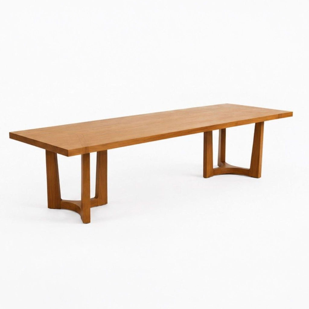 Dining table features solid wood, hand-selected veneers, and elegant pedestal base by Holly Hunt.