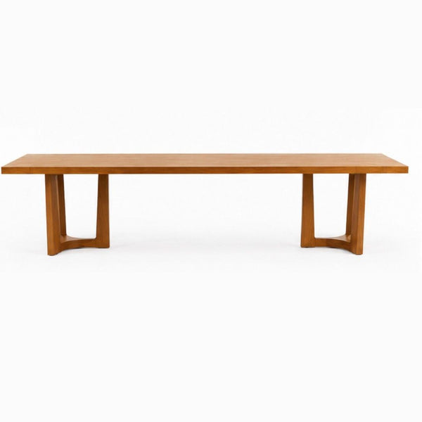 Round pedestal dining table in wood veneer by Holly Hunt, handmade with durable finish.