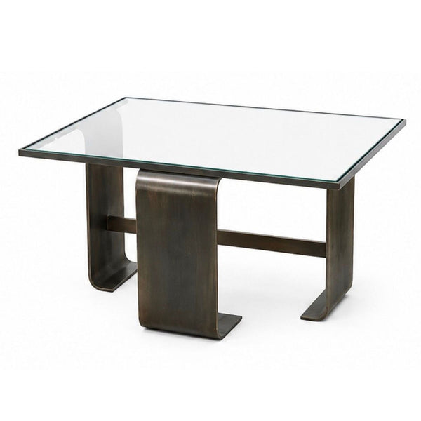 Minimalist Marmol Radziner side table with a steel base and a clear glass top.
