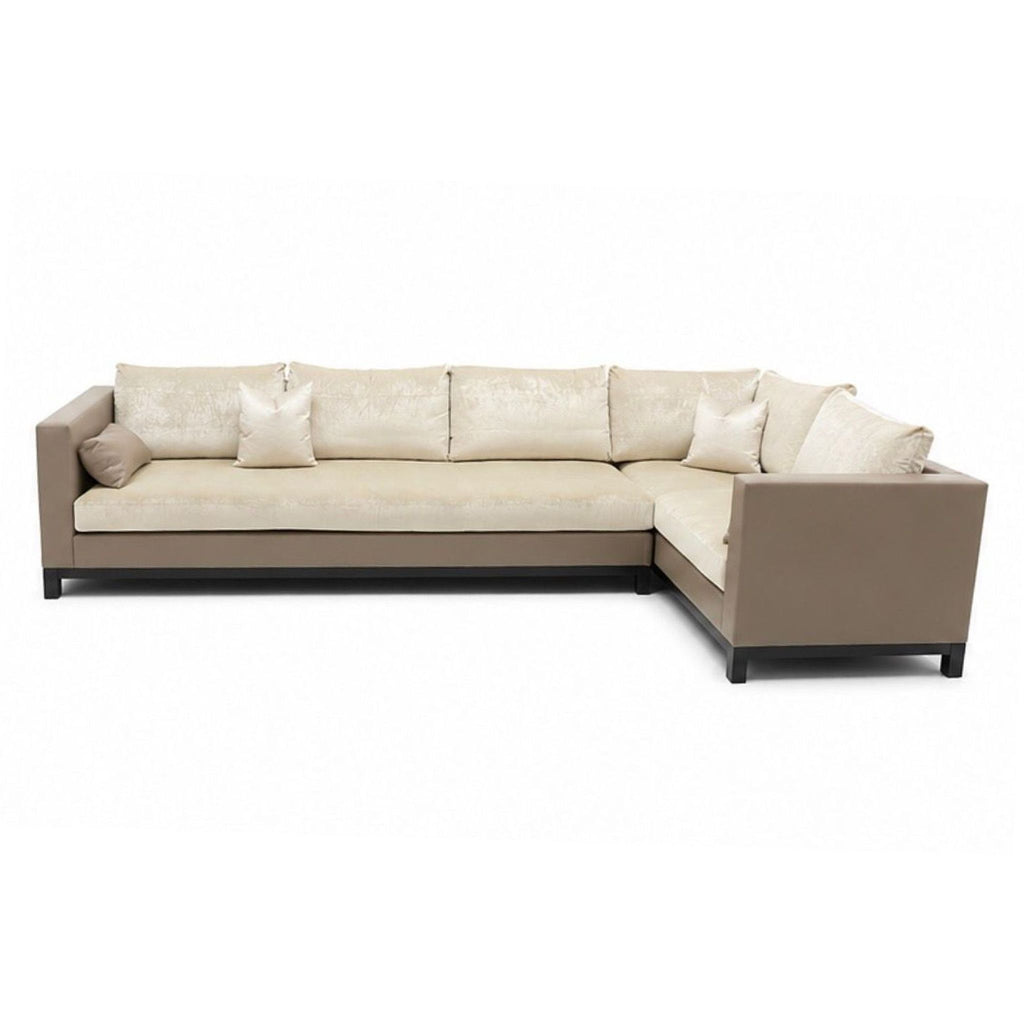 Luxury sectional sofa by Holly Hunt, model Valerie, with plush cushions and modular style, made in 2015.