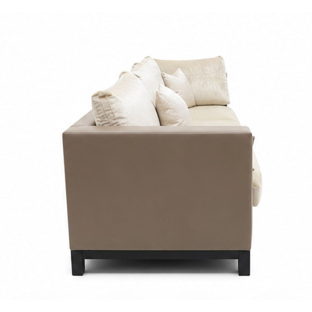 Contemporary Holly Hunt sectional couch in a neutral tone, featuring spacious seating and sleek 2015 silhouette.  