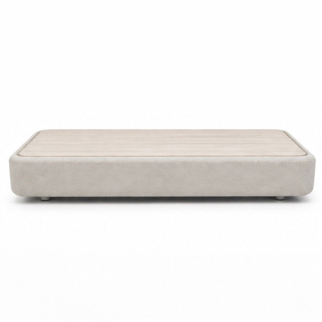 Round Cove Coffee Table by Paola Lenti, modern minimalist design, from 2015, shown in a neutral finish.