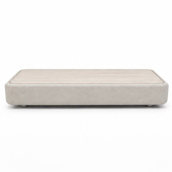 Round Cove Coffee Table by Paola Lenti, modern minimalist design, from 2015, shown in a neutral finish.