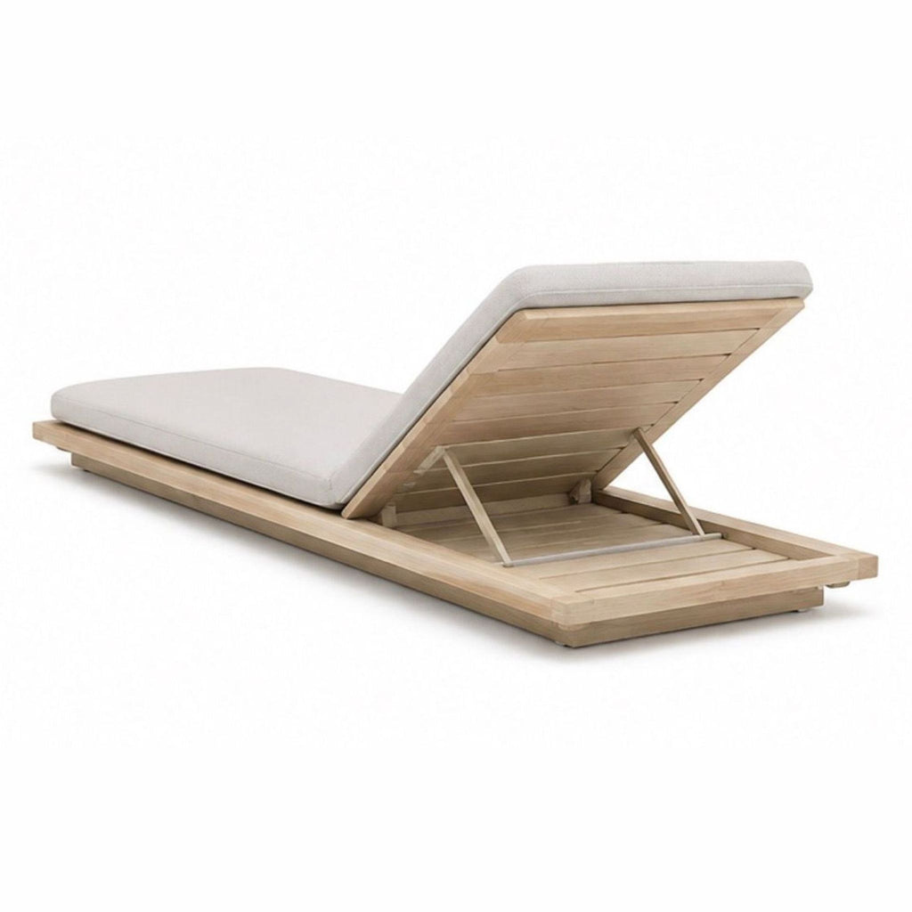 Contemporary Paola Lenti Sabi chaise lounge, category chairs, featuring elegant curves and premium upholstery.  