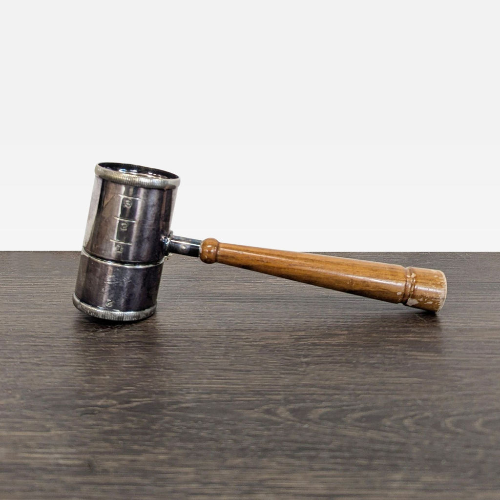 1. Vintage silver-plated cocktail jigger shaped like a judge’s gavel with a wooden handle and Art Deco design.