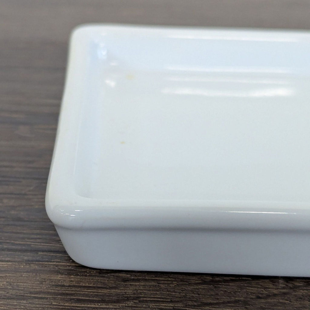 Pottery Barn stoneware plate featuring a simple design and subtle texture, perfect for everyday use.