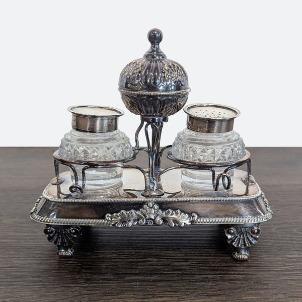 1. Vintage silver plated condiment set with ornate stand, two glass shakers, and a covered mustard holder.