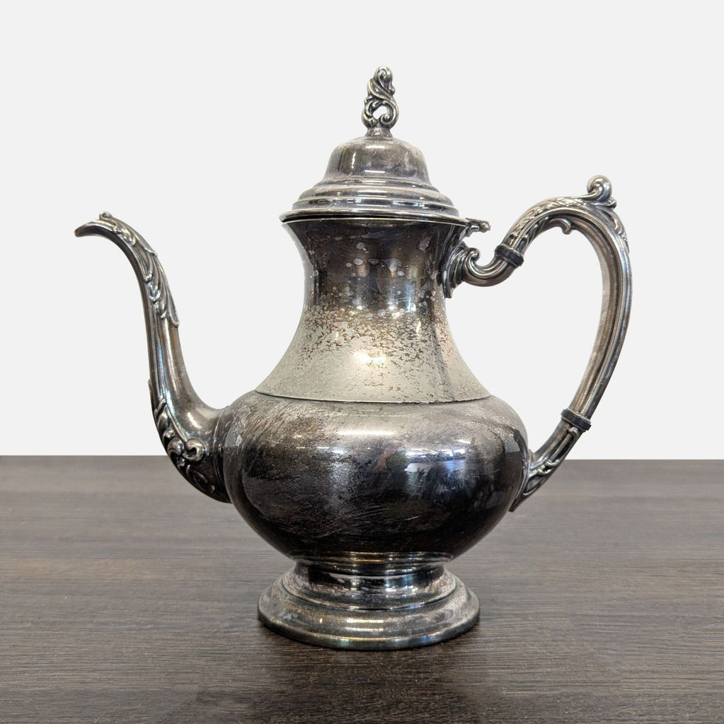 Vintage Silver-Plated Teapot with Ornate Handle and Spout