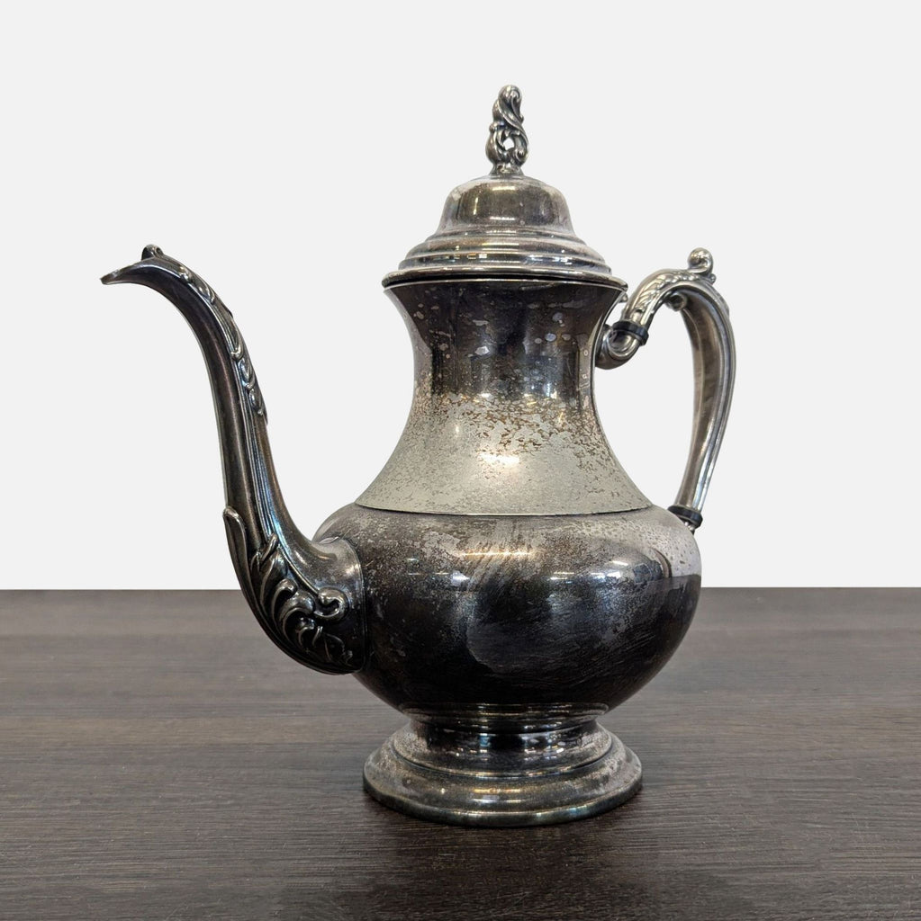 Vintage Silver-Plated Teapot with Ornate Handle and Spout