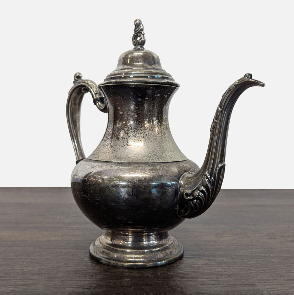 Vintage Silver-Plated Teapot with Ornate Handle and Spout