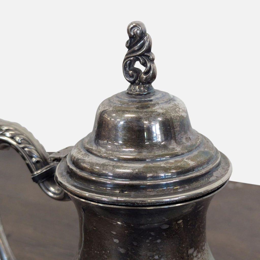 Vintage Silver-Plated Teapot with Ornate Handle and Spout