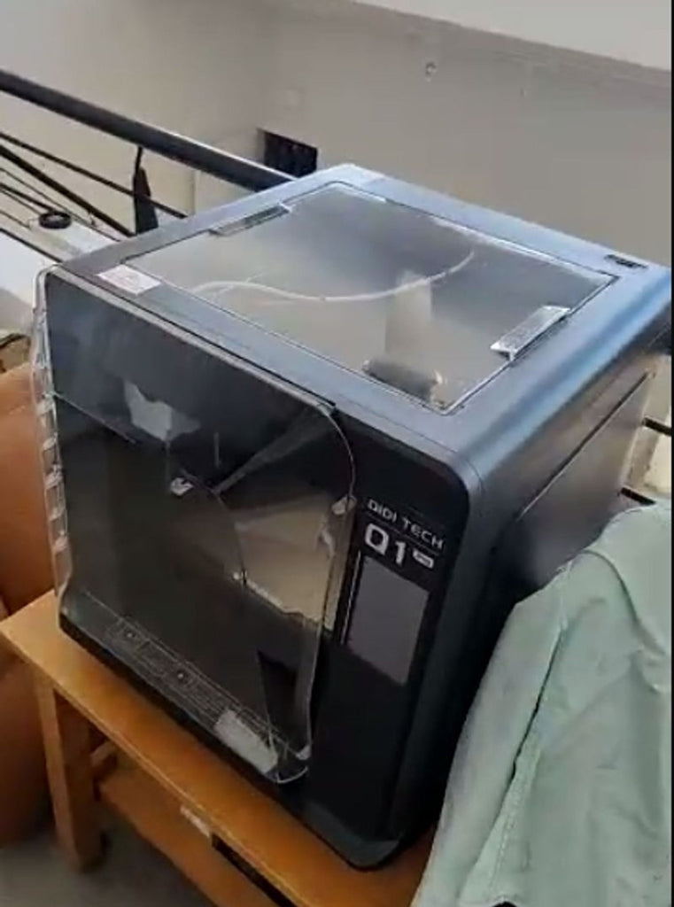 QIDI Q1 Pro 3D printer, purchased June 2024, lightly used, sits on a tabletop.  