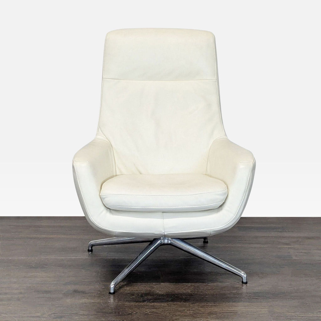 Ikea High-back white leather-look swivel lounge chair. 2019. I don't have the exact original price, but based on googling around it seems like it was roughly $400.