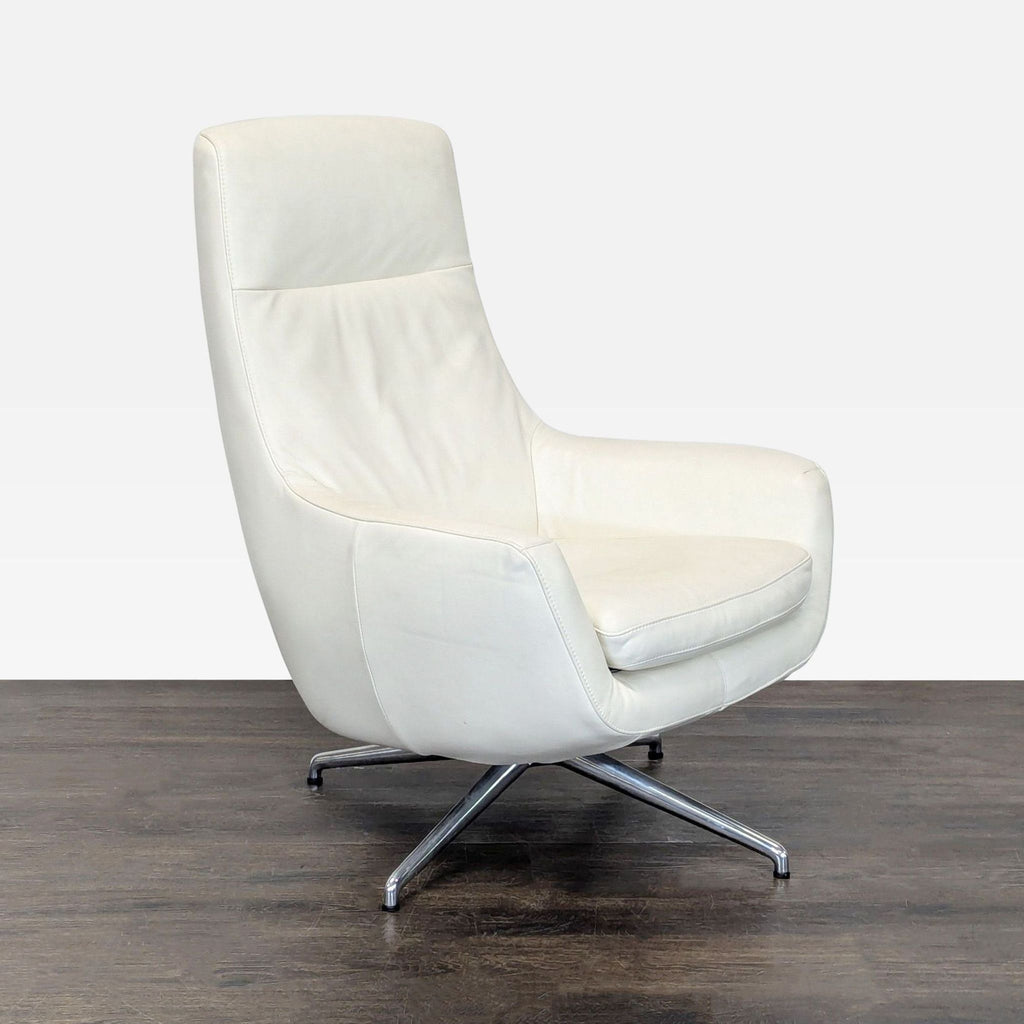 Ikea High-back white leather-look swivel lounge chair. 2019. I don't have the exact original price, but based on googling around it seems like it was roughly $400.