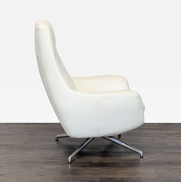 Ikea High-back white leather-look swivel lounge chair. 2019. I don't have the exact original price, but based on googling around it seems like it was roughly $400.
