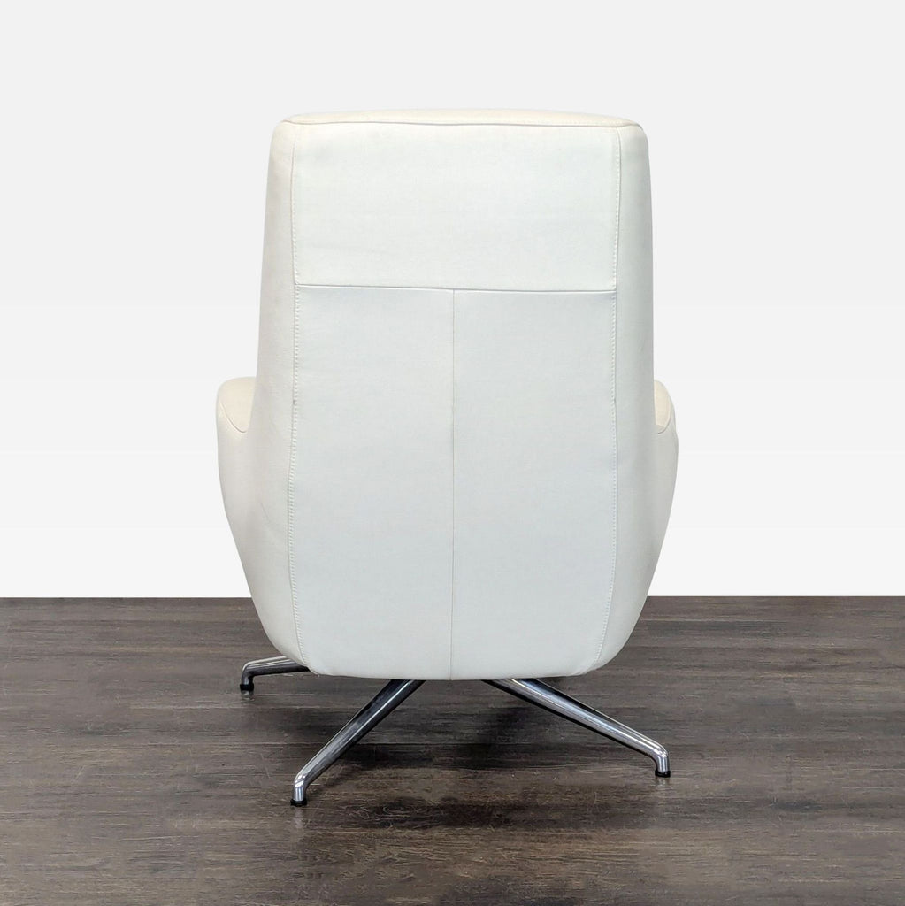 Ikea High-back white leather-look swivel lounge chair. 2019. I don't have the exact original price, but based on googling around it seems like it was roughly $400.