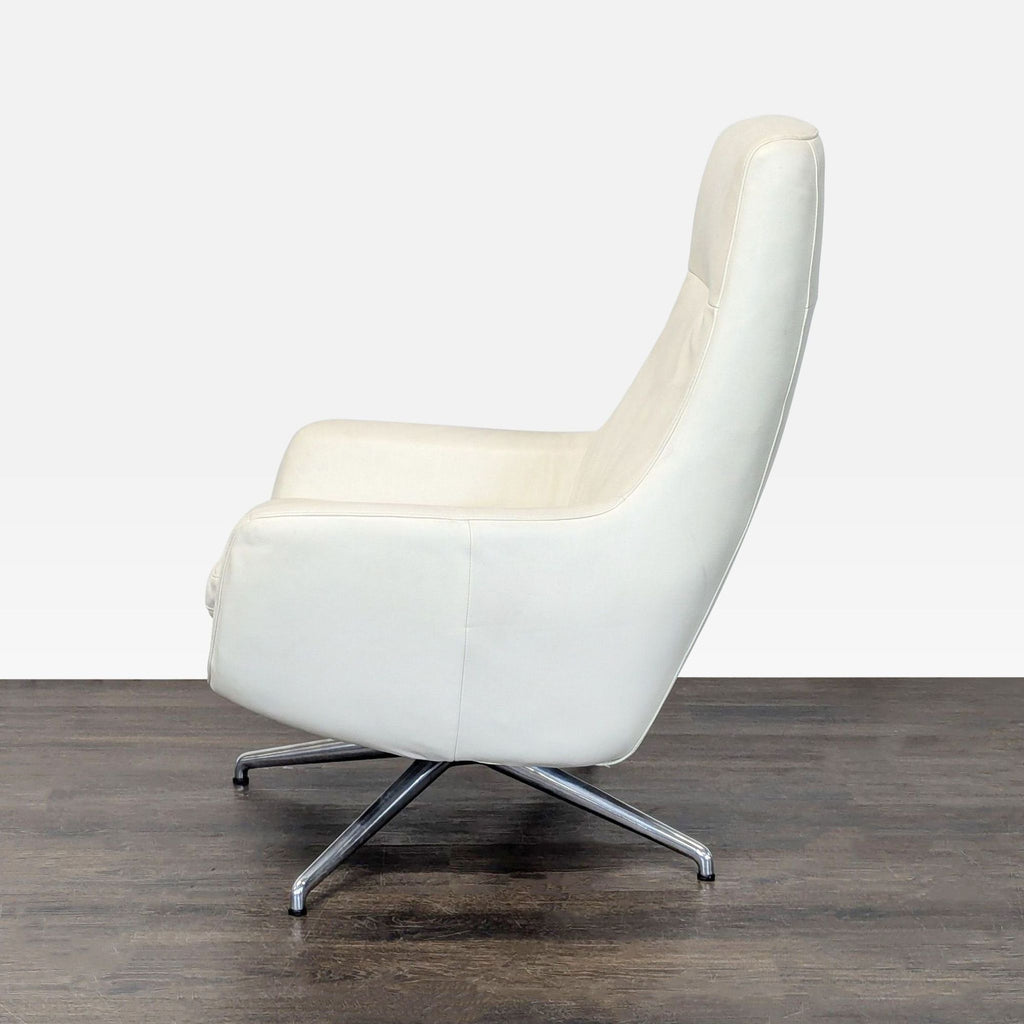 Ikea High-back white leather-look swivel lounge chair. 2019. I don't have the exact original price, but based on googling around it seems like it was roughly $400.