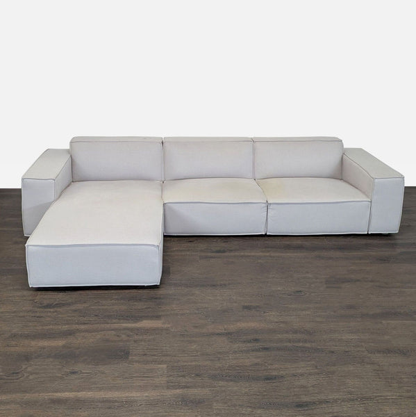 Light neutral Rove Concepts sectional with left chaise lounge, modern style, and ample seating for living rooms.
