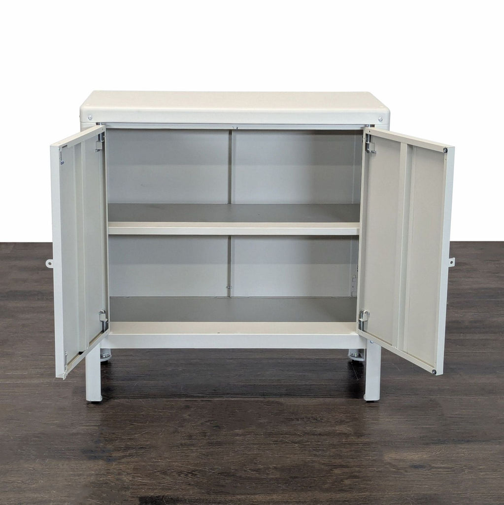 Sleek two-door Ikea cabinet featuring a shelf in the middle, perfect for organizing household items.