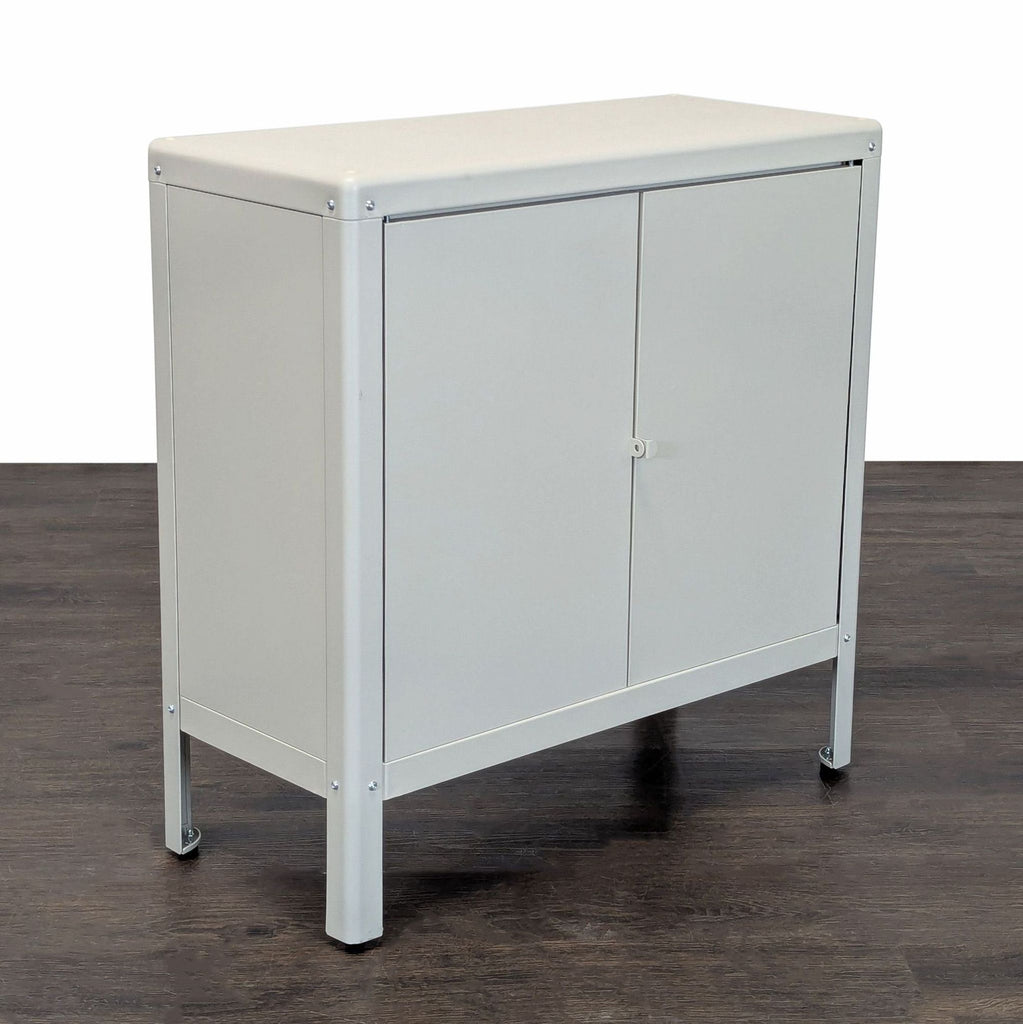 Modern Ikea cabinet from the Cabinet category, with twin doors and a shelf for flexible storage solutions.