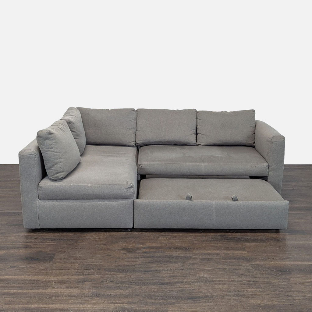 Room & Board sectional with pull out ottoman and under storage