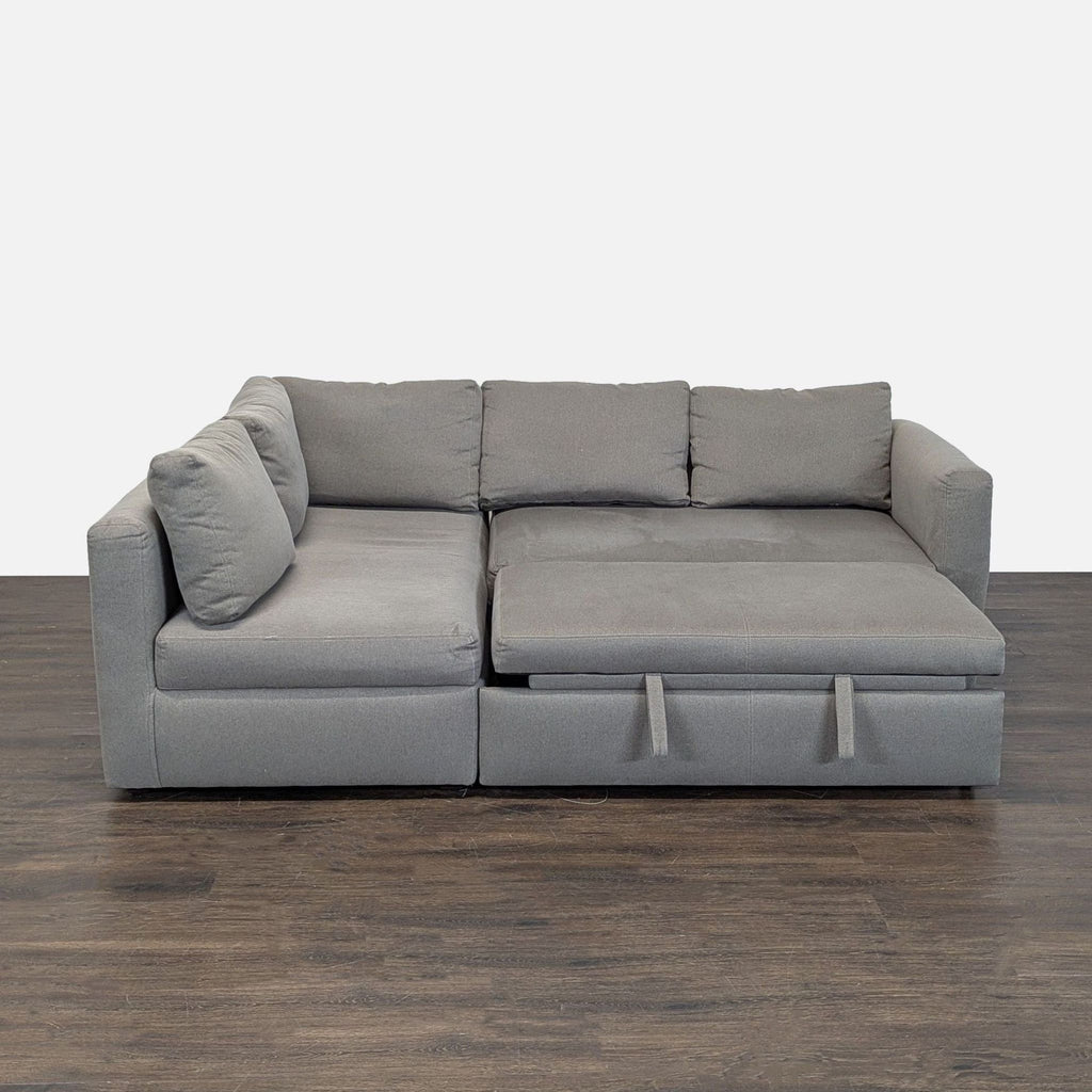 Room & Board sectional with pull out ottoman and under storage