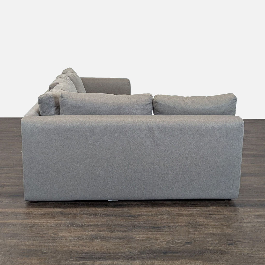 Room & Board sectional with pull out ottoman and under storage