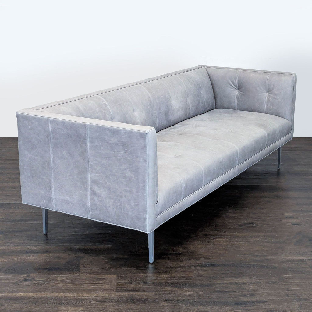 Annata Grey Room & Board 90” leather sofa featuring three seats, contemporary style.