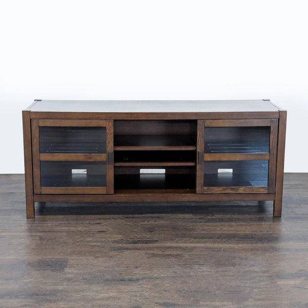 Crate & Barrel wooden entertainment center with glass doors, metal hardware, side cabinets, and central shelves.