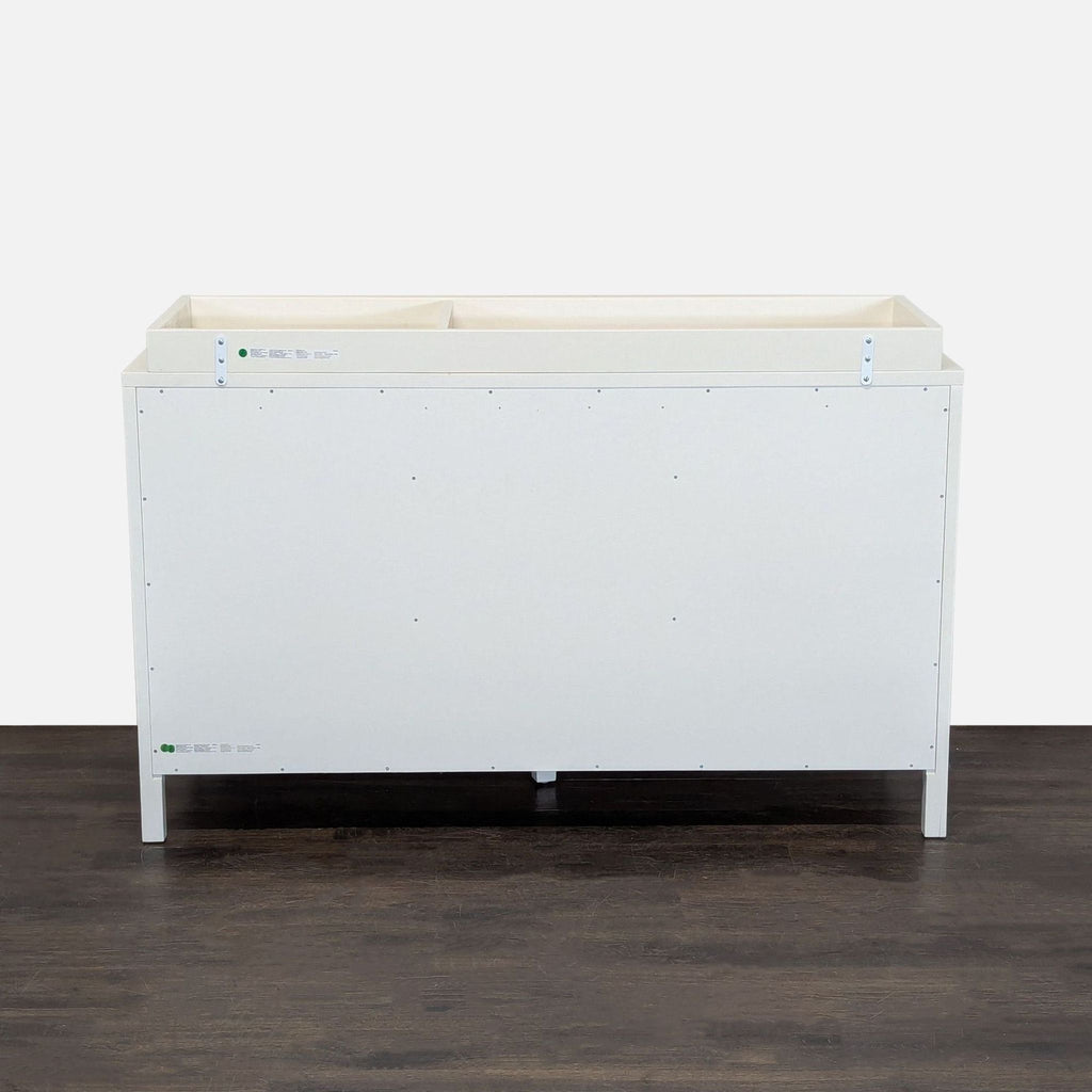 Pottery Barn Kids nursery dresser with spacious drawers, clean white finish, and an attached changing table.