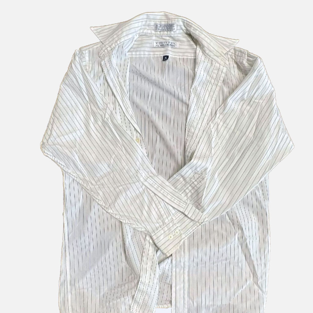 2. Stylish men's Van Heusen dress shirt, displayed in a formal setting, emphasizing the elegant collar design.