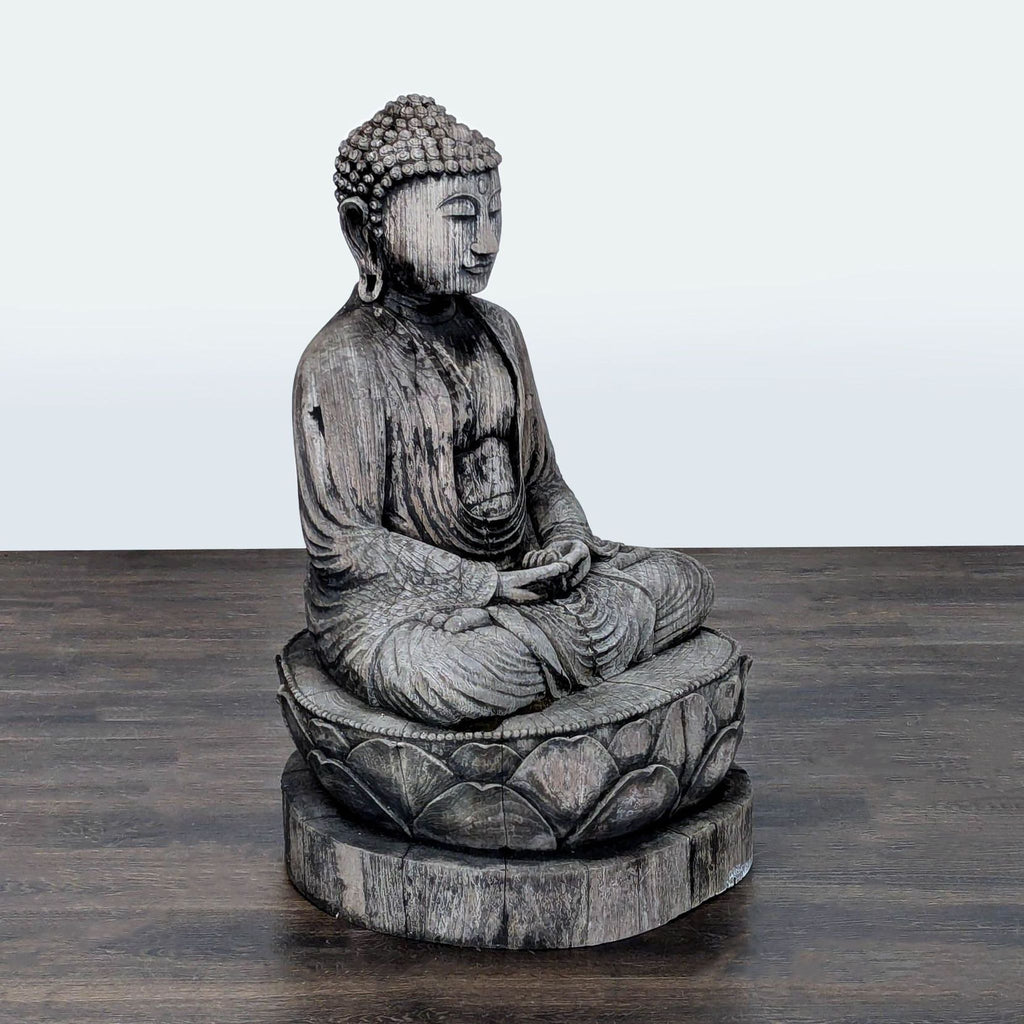 2. Side view of a carved Buddha sculpture in meditation pose on a lotus pedestal, with visible wood grain texture.  