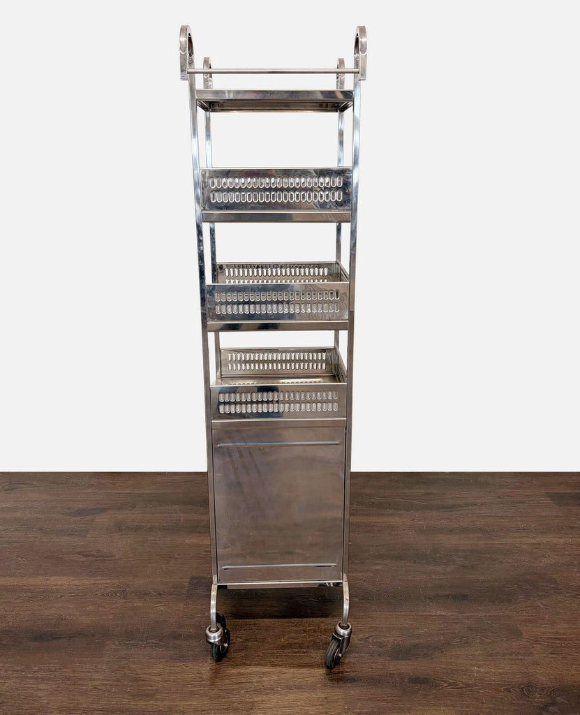 Kitchen storage cart featuring four metal shelves, sturdy handles, and caster wheels for mobility.