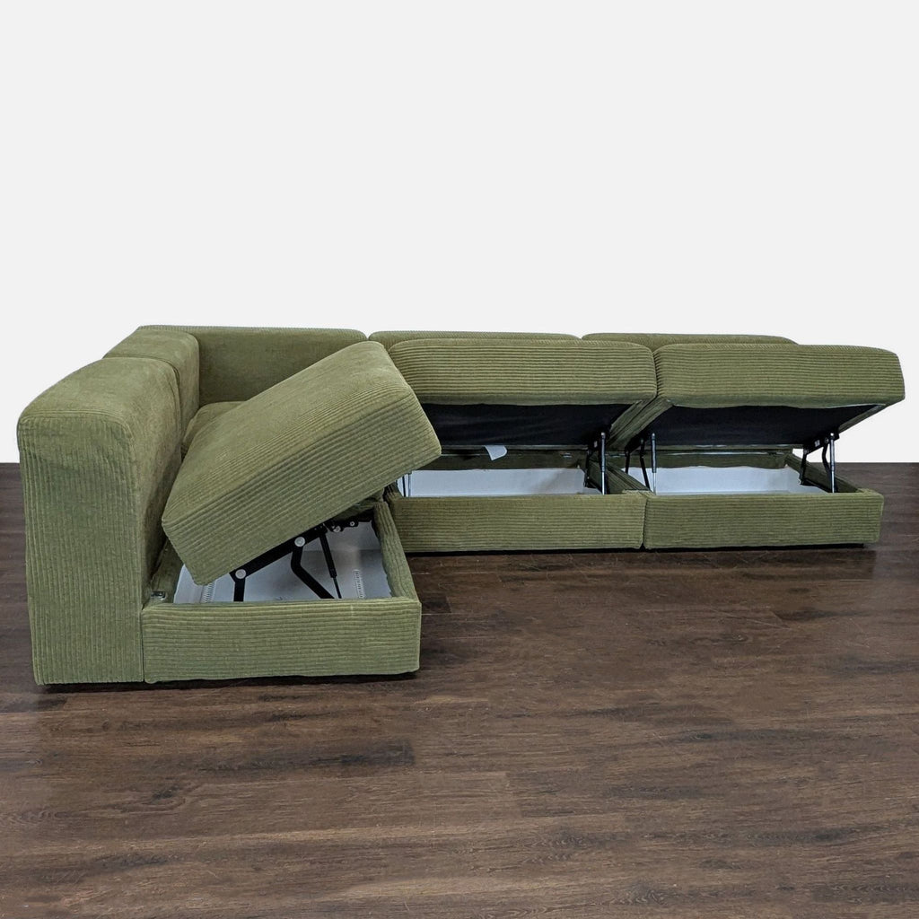 Ikea L-shaped green corduroy sectional; seats lift for storage, combining comfort, modern style, and organization.