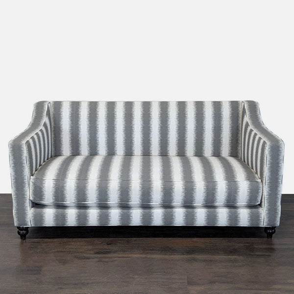 Modern 3-seat sofa with gray and white stripes and cushioned seating, ideal for living rooms or offices.