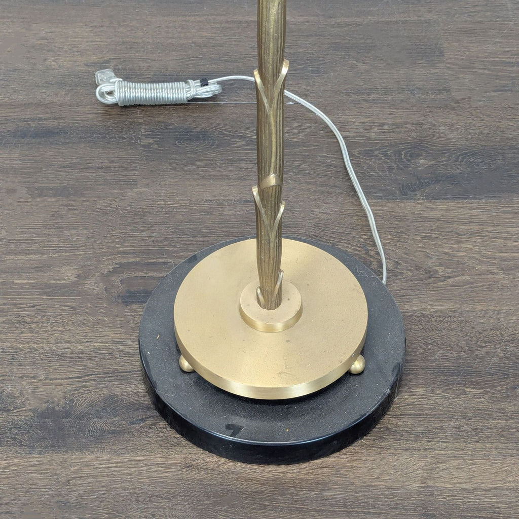 Elegant brass floor lamp with marble base, drum shade, and pull chain switch for classic lighting.  
