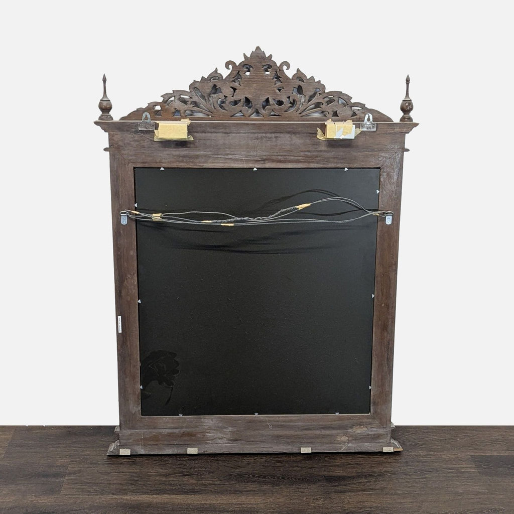 Ornate Thai mirror made in 2005, featuring detailed teak wood carving from Baan Tawai village.  