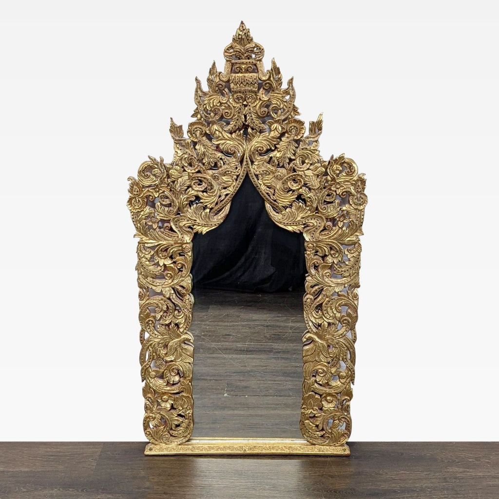 Hand-carved and gilded teak mirror from Baan Tawai, Chiang Mai's renowned handicraft village, made in 2005.