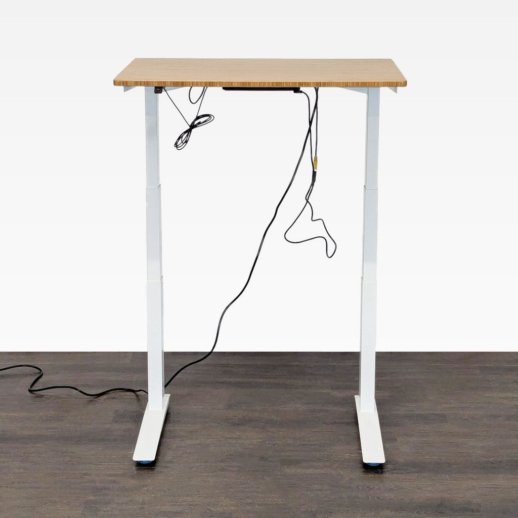 Modern Fully desk features electric height adjustment, bamboo surface, and a sturdy white frame for flexible working.