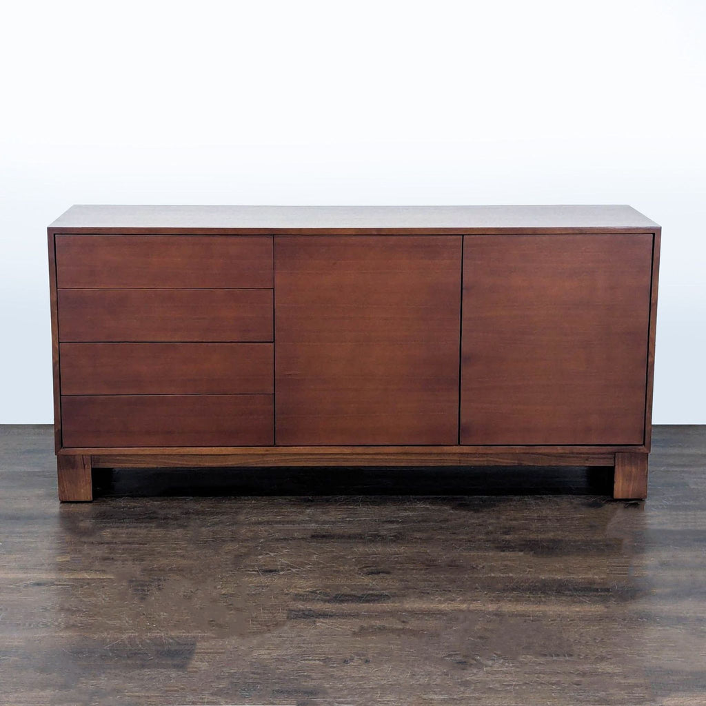 1. Modern entertainment center by Mitchell Gold + Bob Williams with sleek shelves and cabinets for storage.