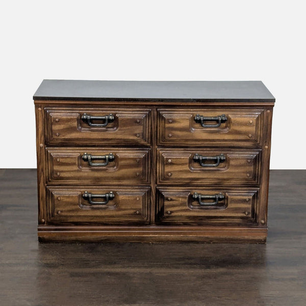 Classic vintage wooden dresser with six drawers and metal handles, ideal for bedroom storage or organization.