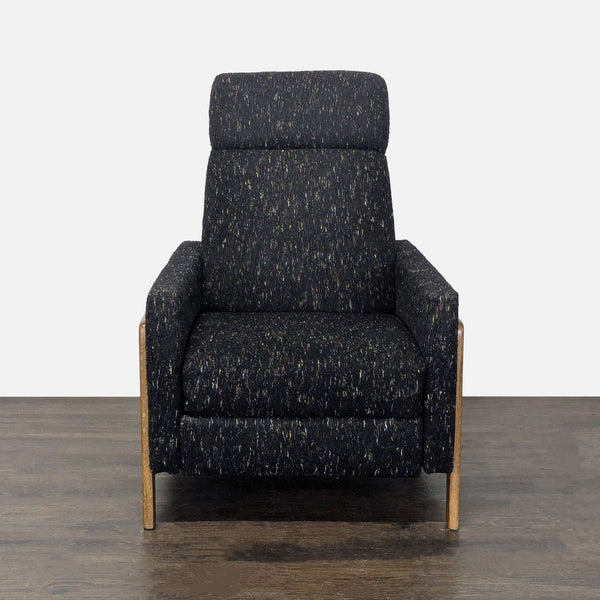 West Elm lounge chair with black speckled fabric, wooden frame, and headrest, perfect for living room relaxation.  