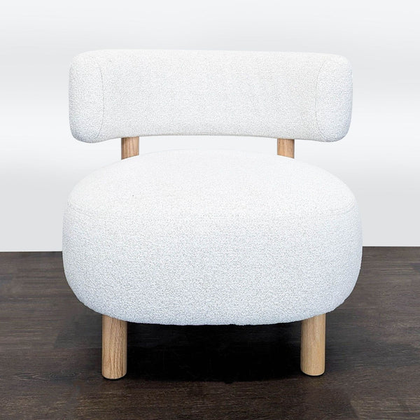 Gray and white Ikea Stockholm 2025 lounge armchair in perfect condition shown in a well-lit room.