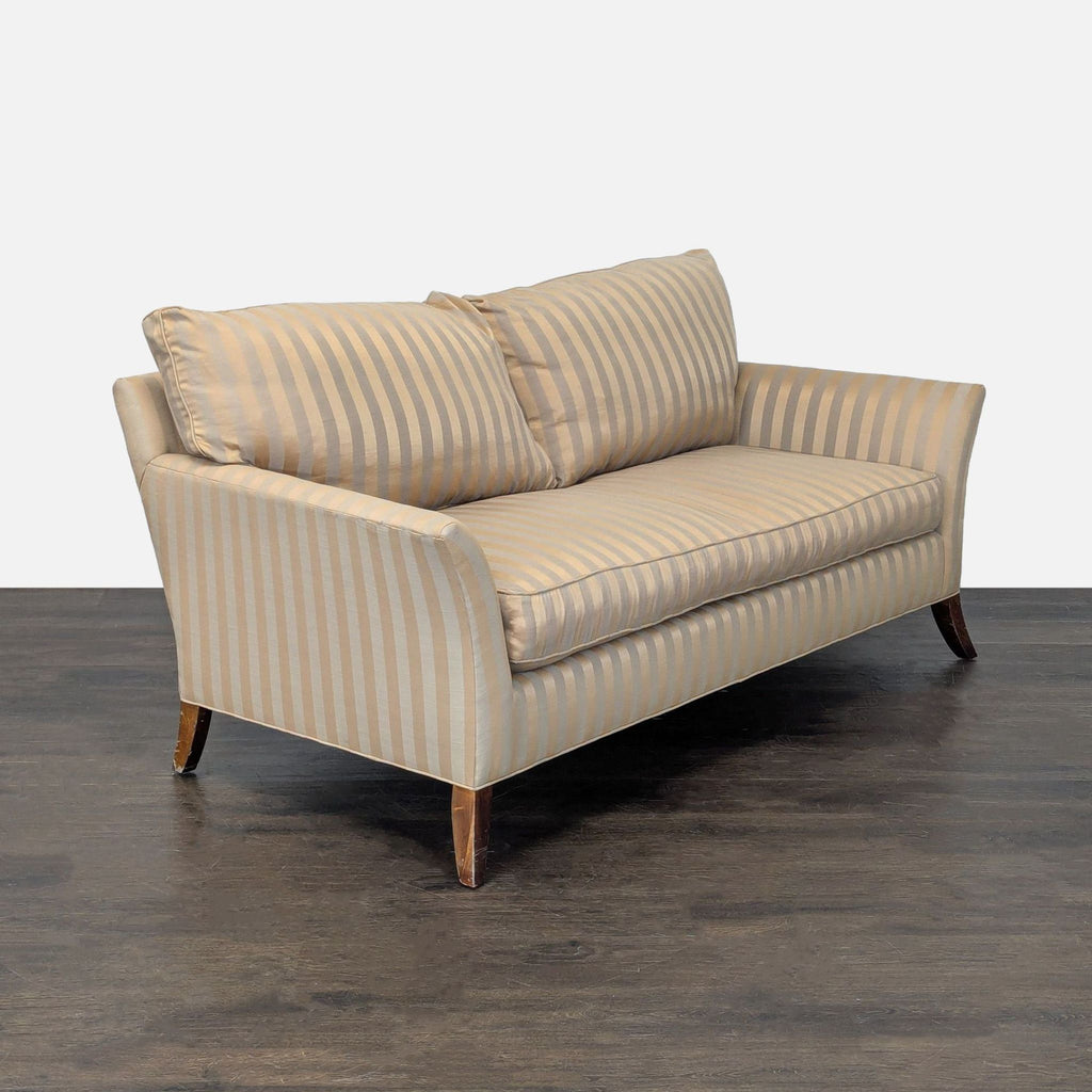 Elegant 3-seat striped sofa with cushioned seating, gently curved arms, and sturdy wooden legs.