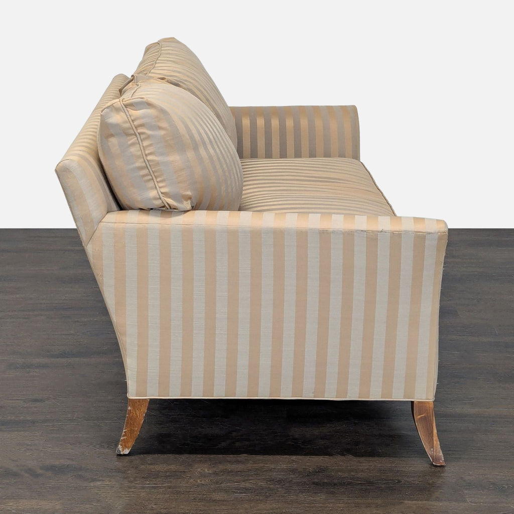 Beige and gold striped 3-seat couch with comfortable cushions and simple, classic design.