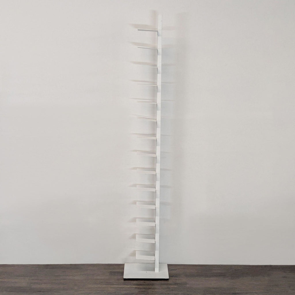 Modern Bruno Rainaldi vertical bookshelf in white, designed for compact areas and versatile use.
