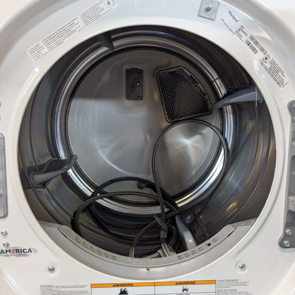 2. Front view of a Whirlpool Washer/Dryer appliance, standing alone with visible control panel.  