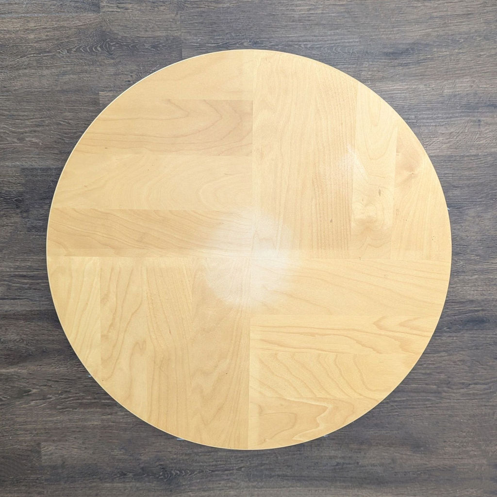 Birch veneer end table from Ikea featuring minimalist Scandinavian style.  
