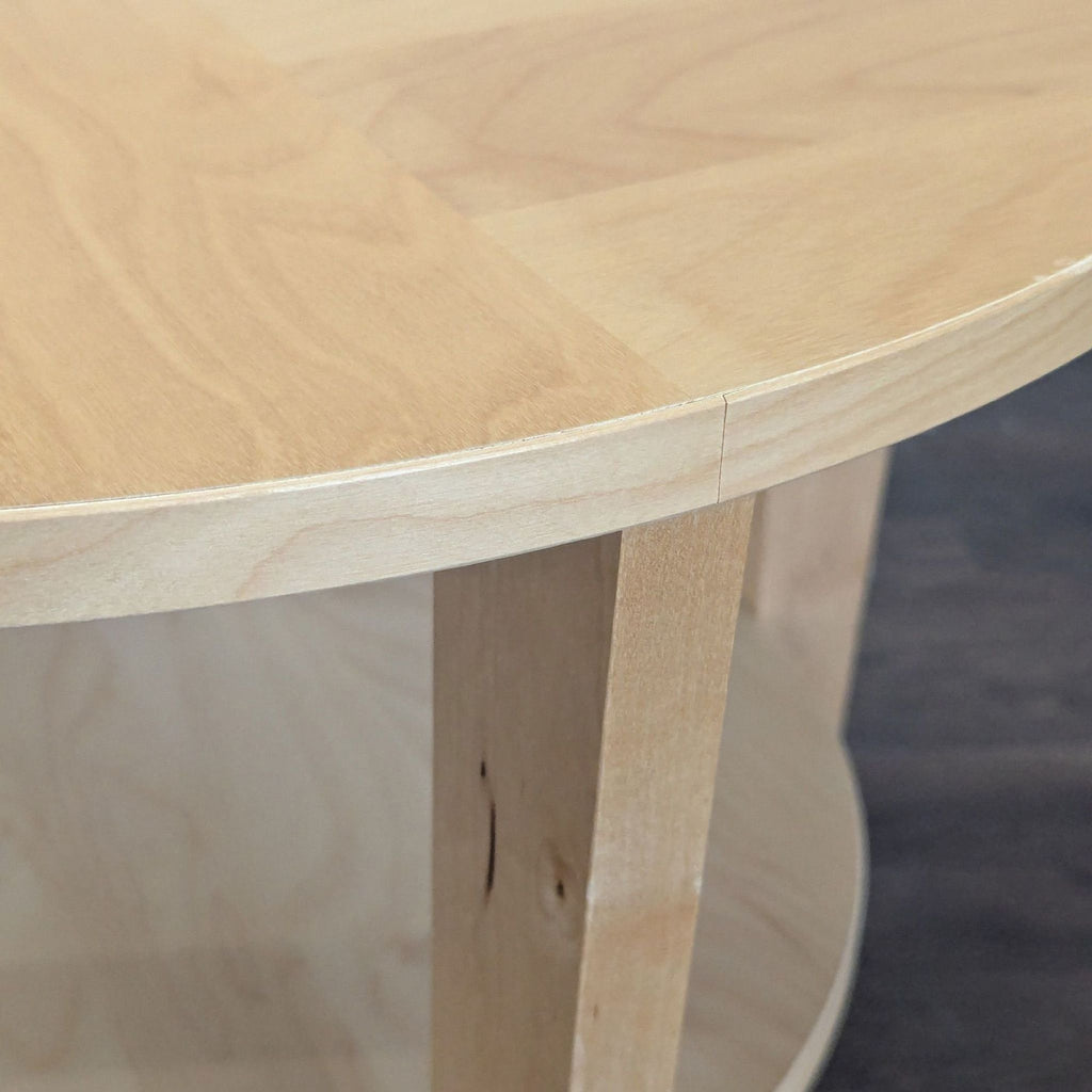 Modern Ikea end table in light birch veneer, ideal for living rooms or bedrooms.