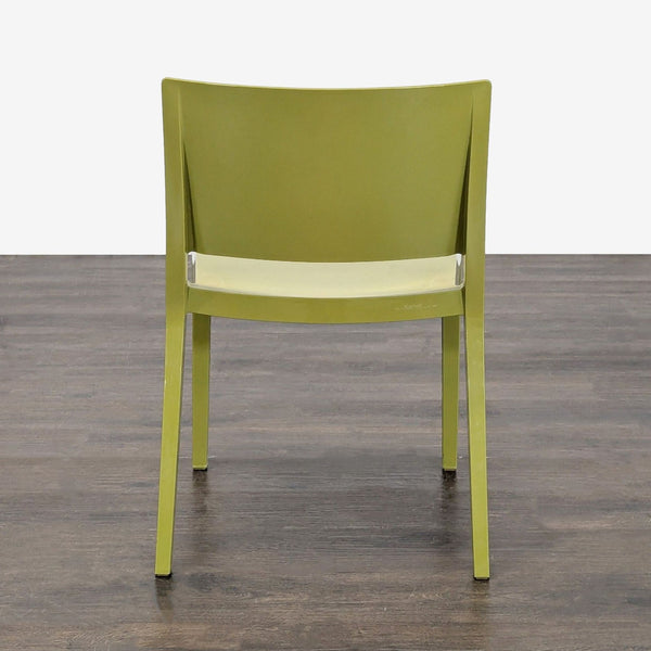 1. Modern Kartell dining chair with sleek lines and minimalist design, perfect for contemporary dining spaces.  